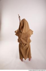 JOEL_ADAMSON STANDING POSE WITH SWORD AND CRUCIFIX